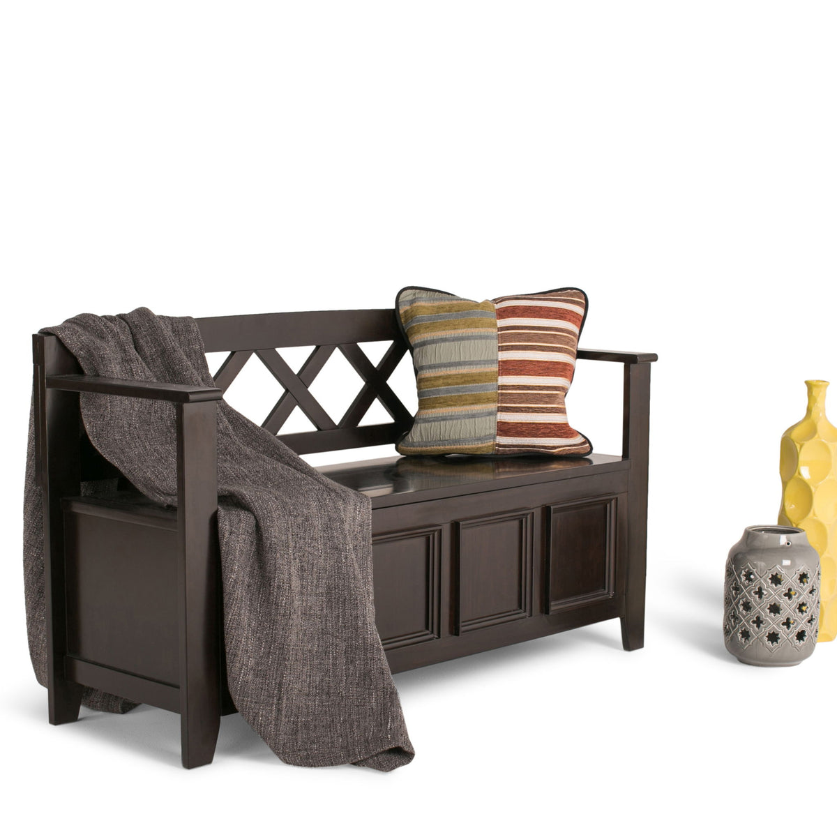 Dark brown storage bench with open shelf, lattice backrest, and cushion