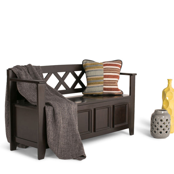 Dark brown storage bench with open shelf, lattice backrest, and cushion