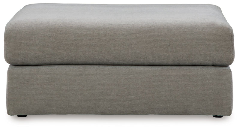Ash gray upholstered oversized ottoman footstool with padded lid and short legs