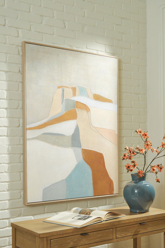 Framed abstract wall art with blue and orange geometric shapes