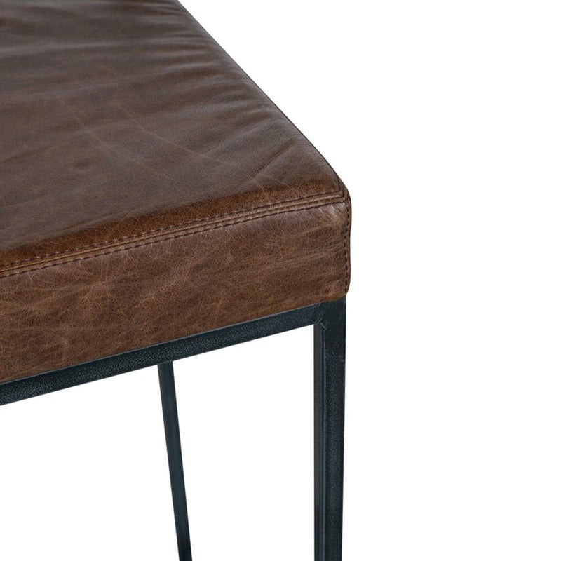 Dark brown upholstered counter stool seat cushion with stitched edge and frame