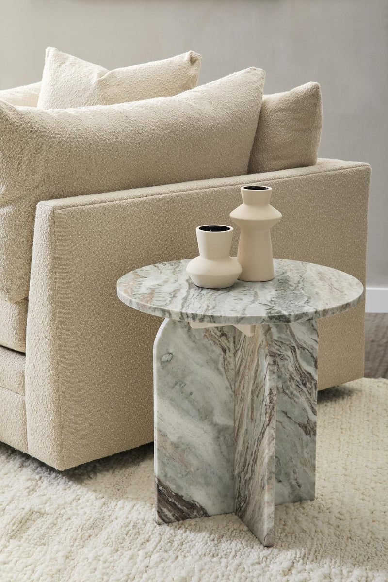 Gray marble round table with pedestal base and decorative vase on top