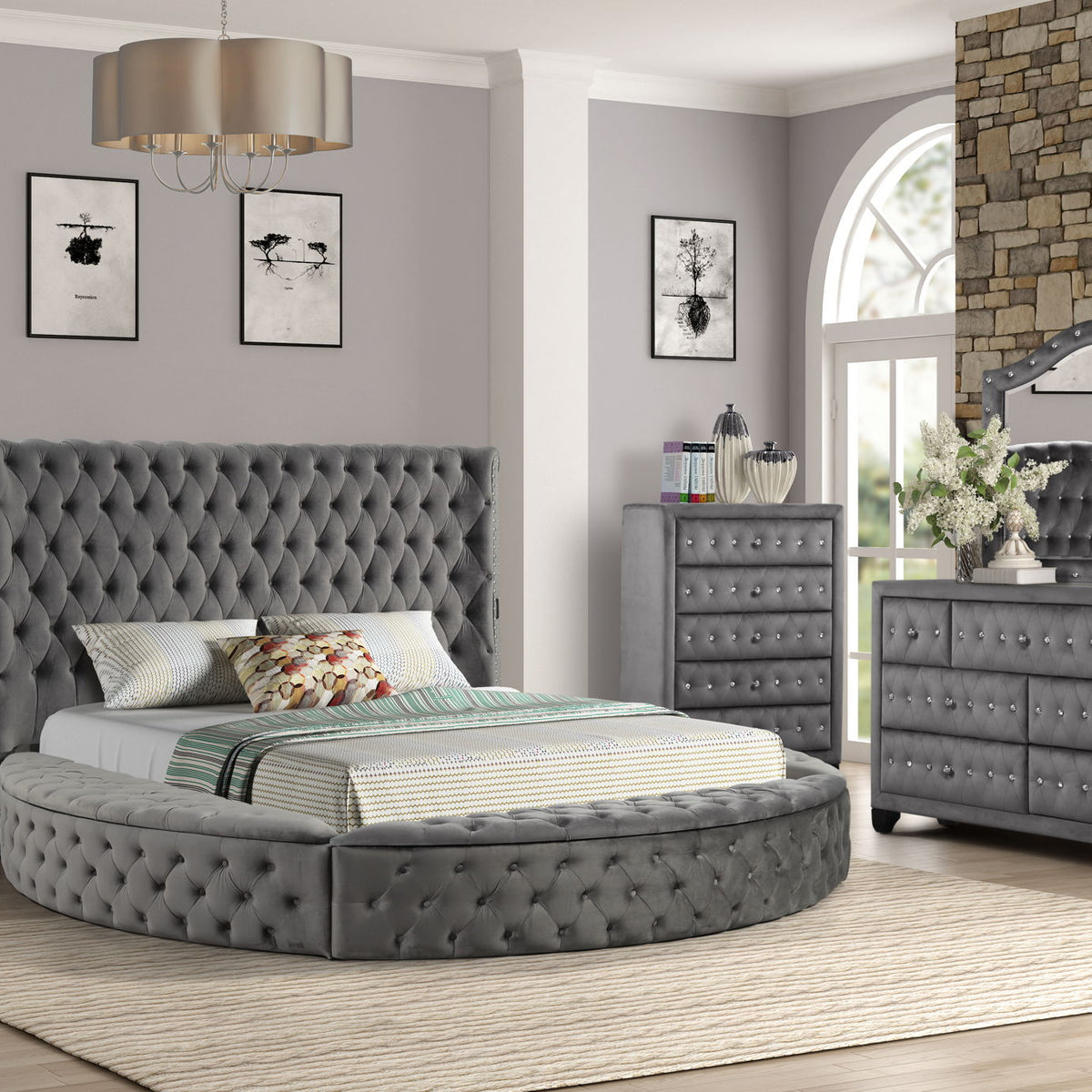Gray king bed with tufted headboard, matching nightstand, dresser and mirror