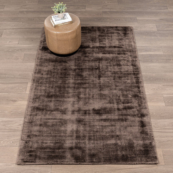Brown taupe distressed area rug with mottled vintage finish