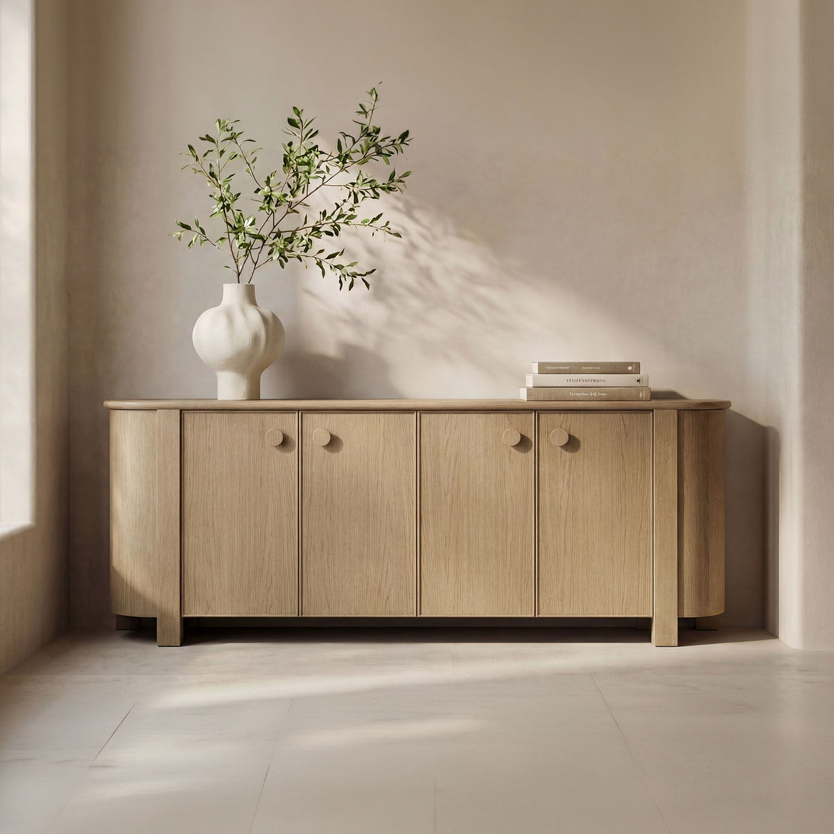 Natural wood sideboard with multiple doors and round knobs, tapered legs