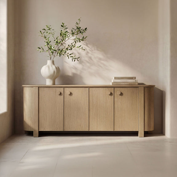 Natural wood sideboard with multiple doors and round knobs, tapered legs