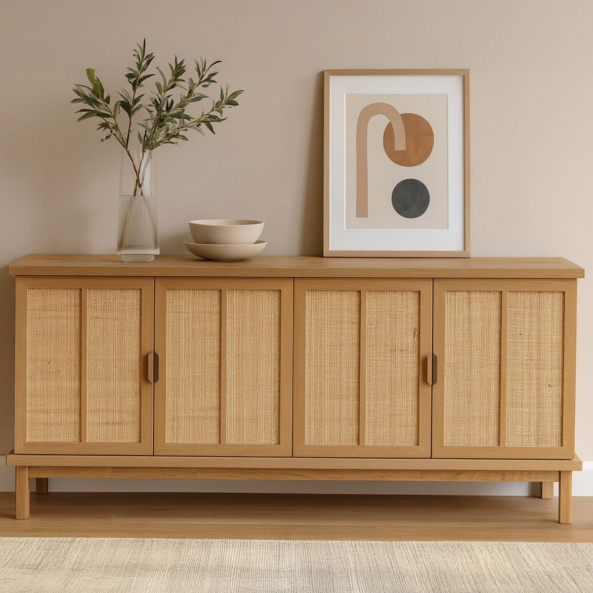 Natural sideboard with six rattan-paneled cabinet doors, dark handles, and flat top