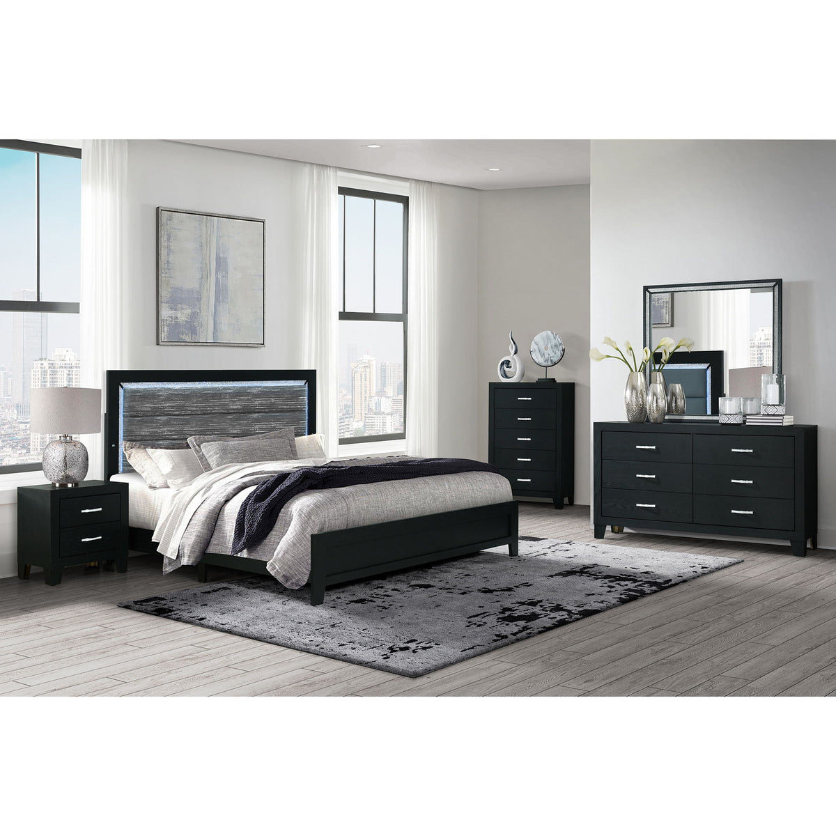 Black queen bedroom set with bed, dresser, and matching nightstands with drawers