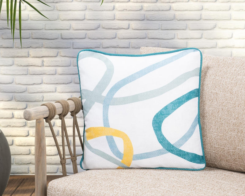 Square throw pillow with white base and teal/blue/yellow abstract print with teal trim.