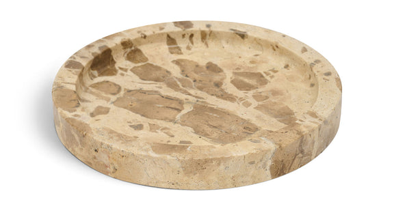 Beige marble tray with round shallow basin and natural veining texture