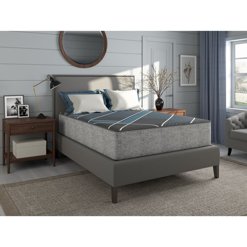 Dark gray plush mattress with blue accent line top, on a bed frame