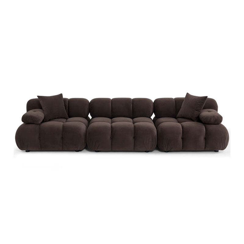 Dark gray modular sofa with rounded cushions and two back pillows