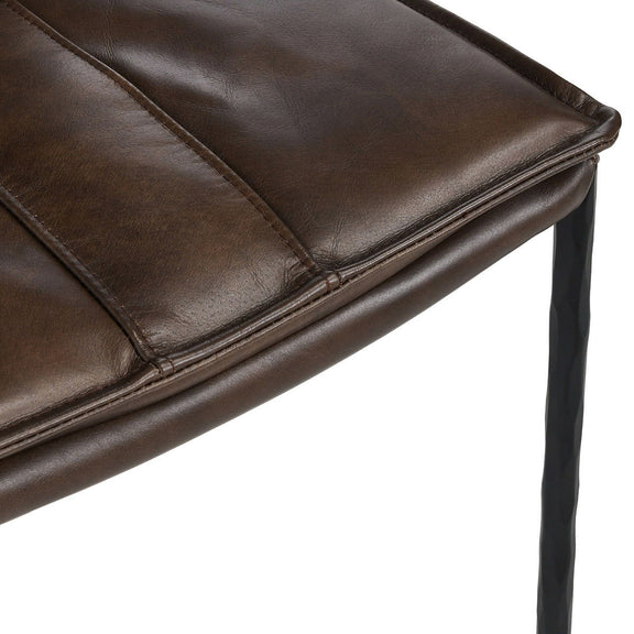 Brown leather-look bar stool seat corner detail with stitched edge and metal frame