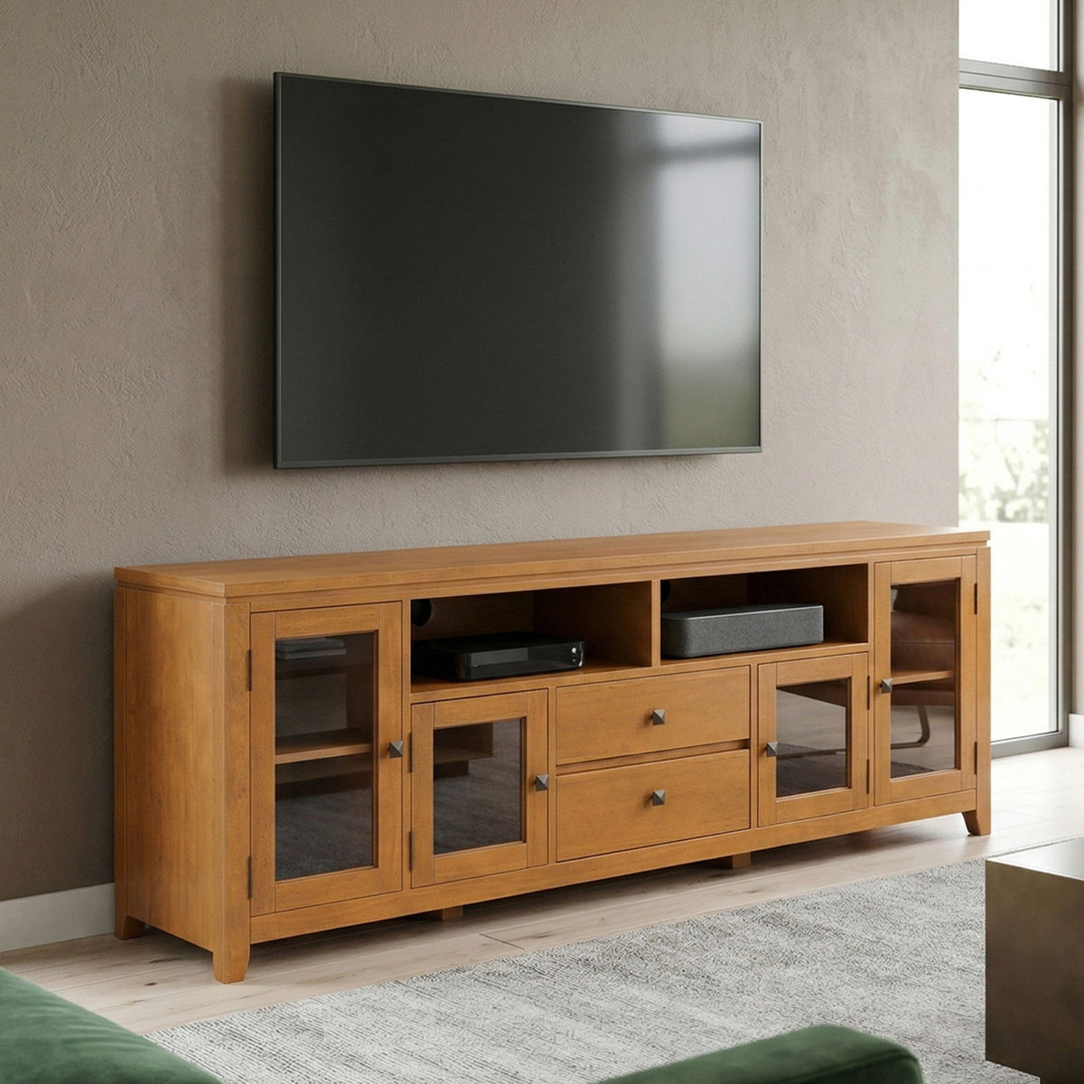 Light brown TV media stand with glass-front doors and open center compartments