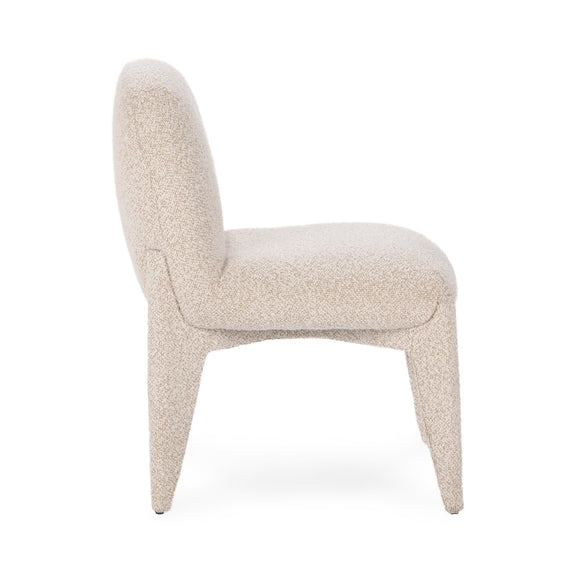 Upholstered dining chair, side view with light beige cushioned seat and curved arms