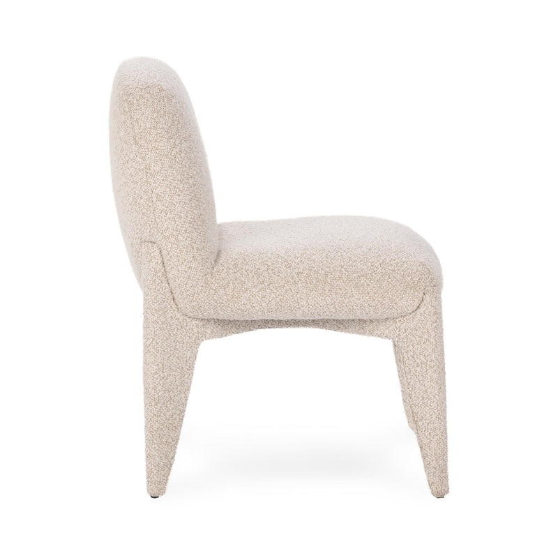 Upholstered dining chair, side view with light beige cushioned seat and curved arms