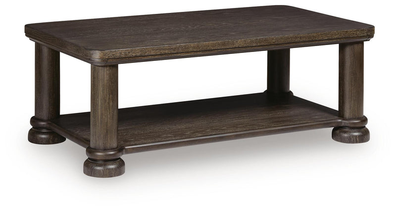 Dark brown rectangular table with lower shelf and turned legs