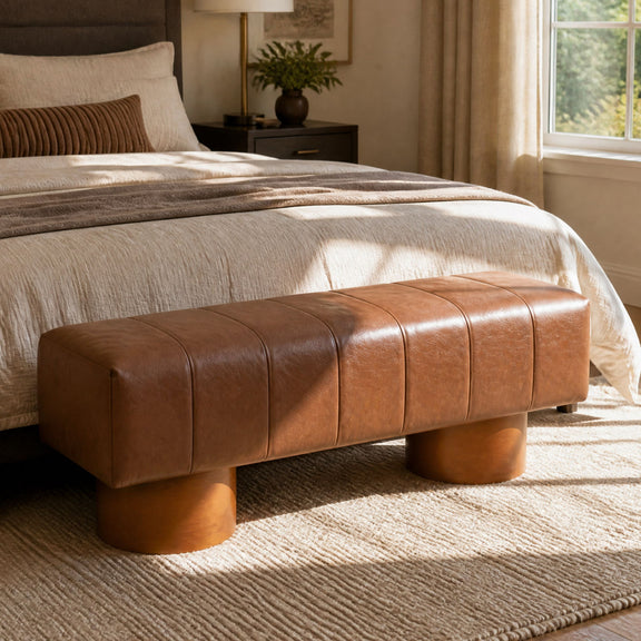 Brown faux leather dining bench with tufted cushion and rounded wooden legs