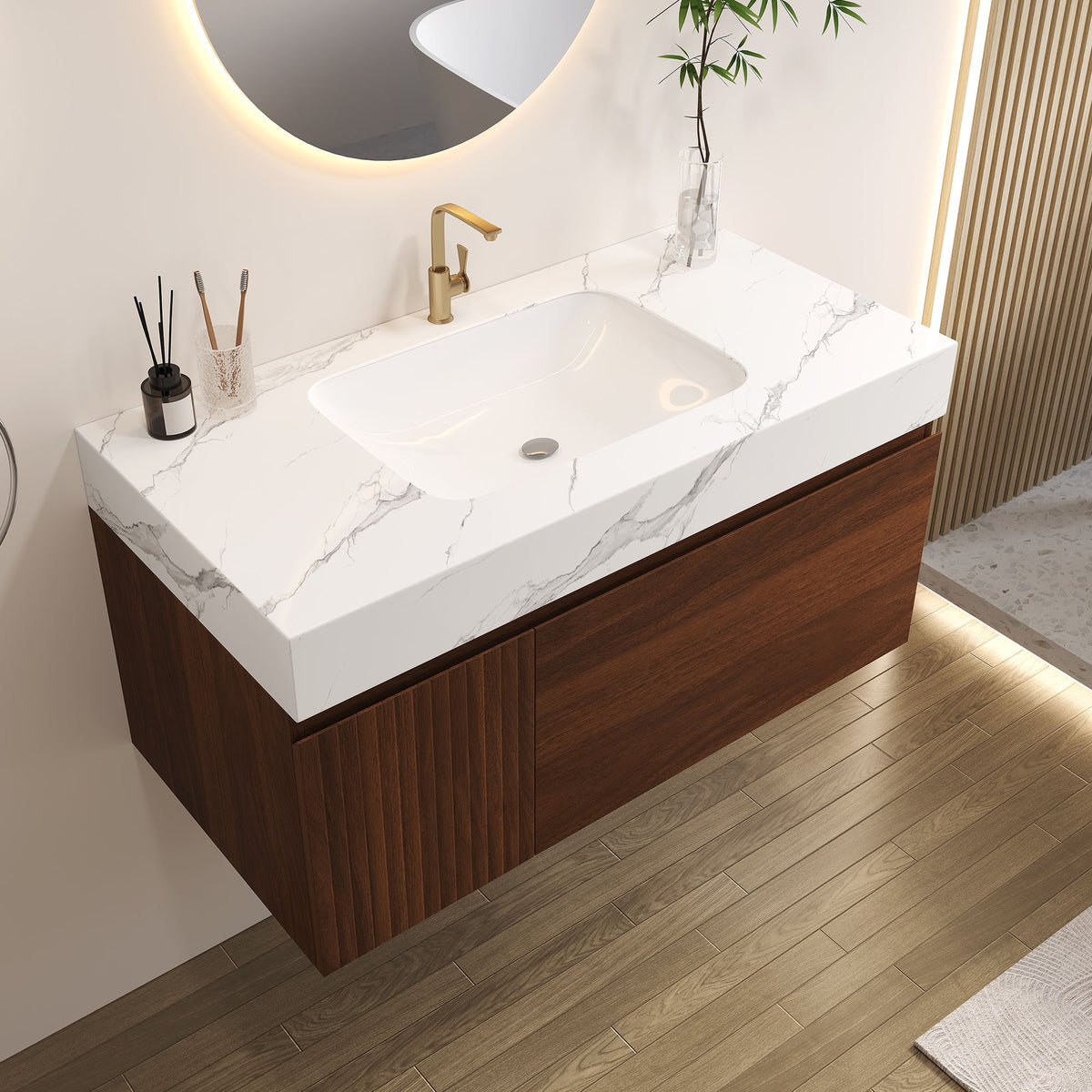 Floating walnut vanity with a white marble-look basin and closed drawer and cabinet