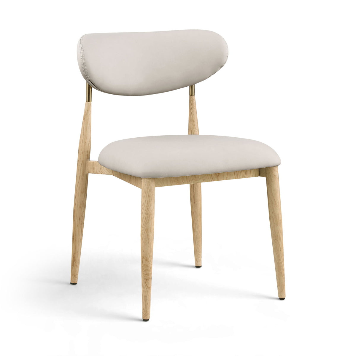 Light neutral upholstered dining side chair with light wood legs and brass accents