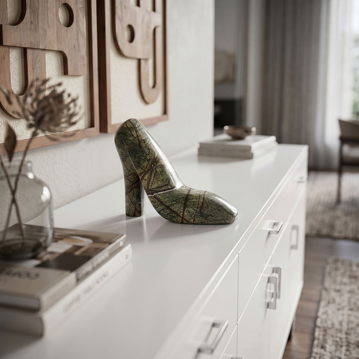 Green marbled marble high-heel shoe tabletop object displayed on a white surface