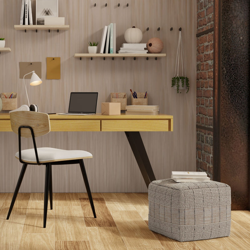Square woven pouf in natural and gray plaid, low profile padded seat.
