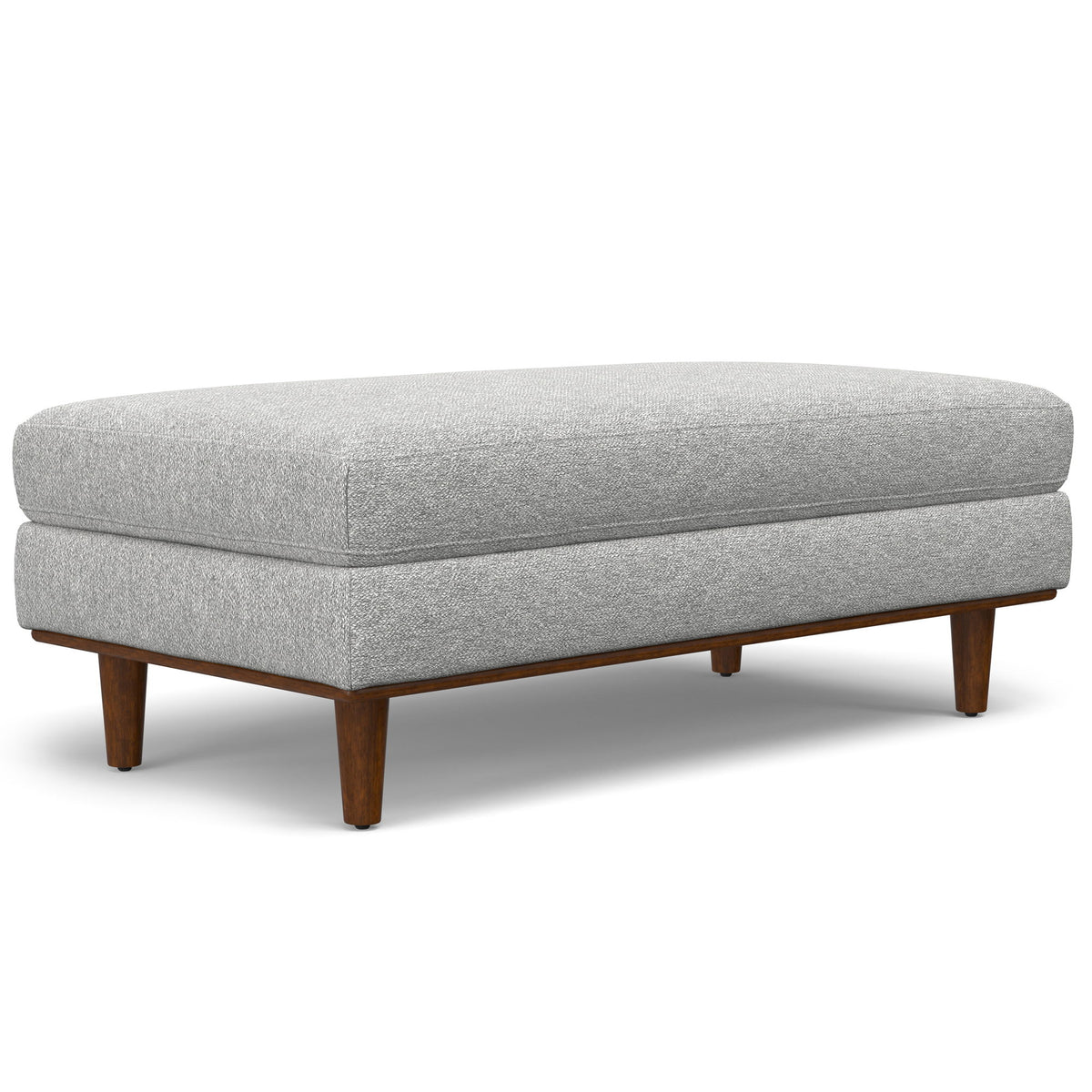 Light gray handcrafted ottoman with cushioned top and wooden legs