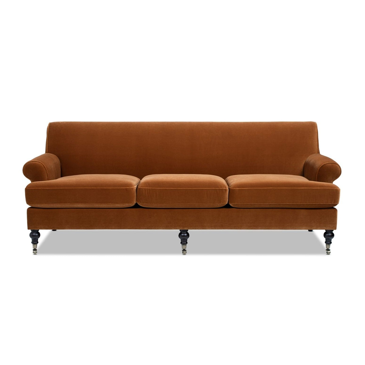 Orange three-cushion sofa with rolled arms and turned wooden legs, upholstered fabric.