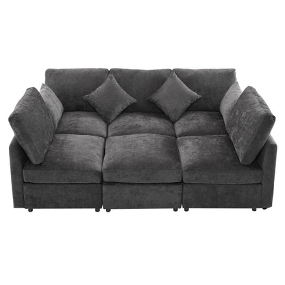 Charcoal gray upholstered loveseat sofa with three seat sections and two accent pillows