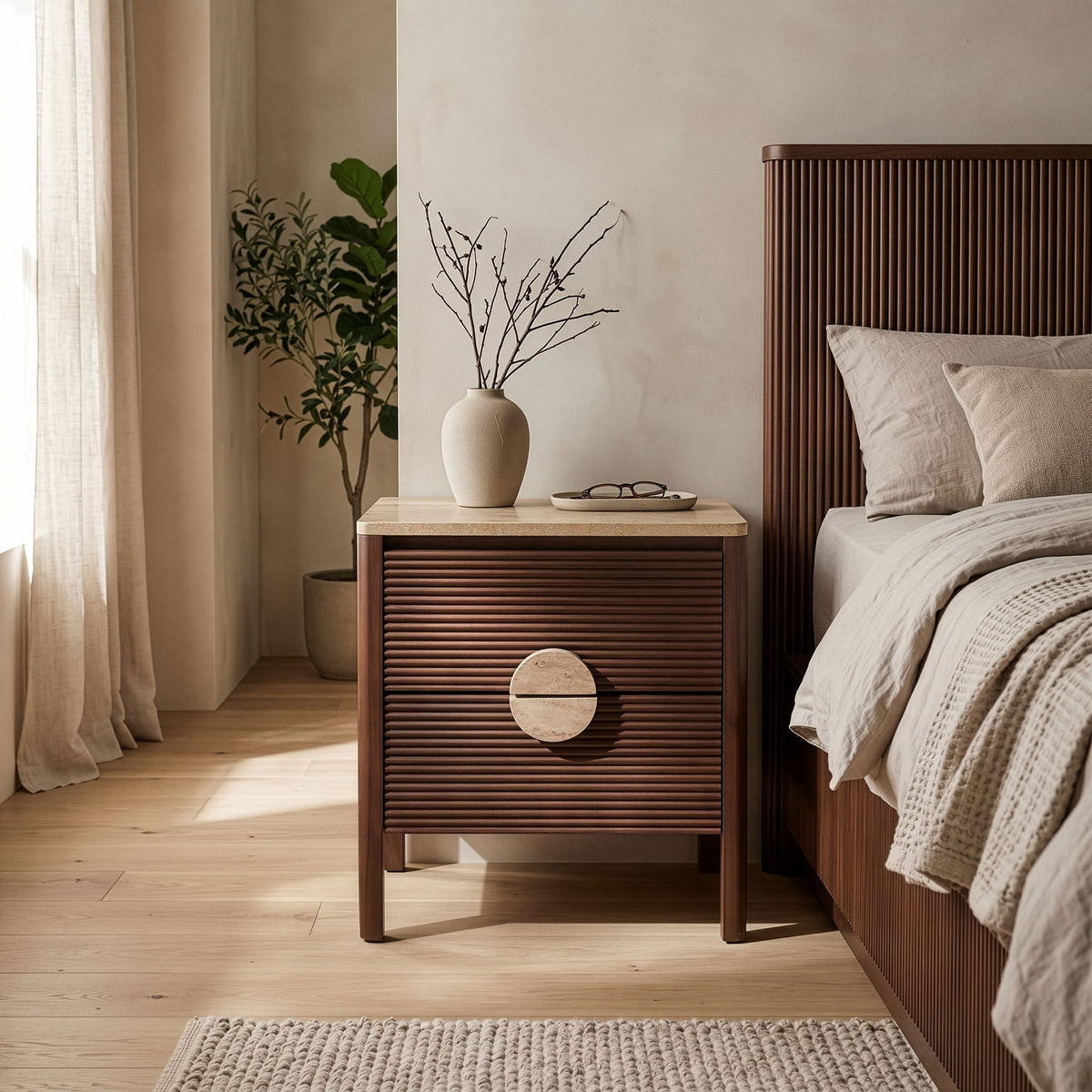 Dark brown acacia wood nightstand with speckled stone top and round drawer pull