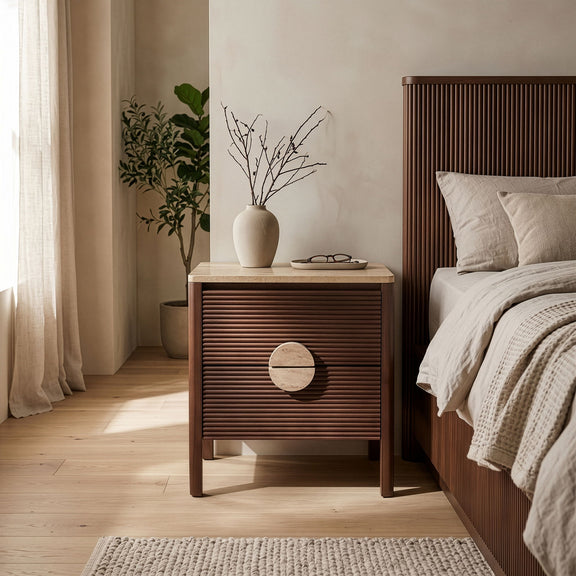 Dark brown acacia wood nightstand with speckled stone top and round drawer pull