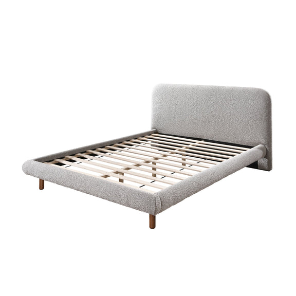 Gray upholstered platform bed with curved headboard and slatted base, wooden legs