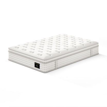 White hybrid mattress with pocket spring edge stitching and tufted top surface