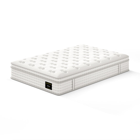 White hybrid mattress with pocket spring edge stitching and tufted top surface