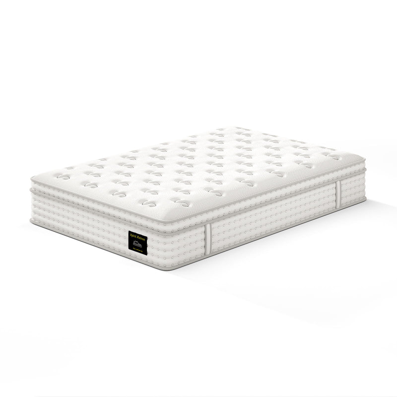 White hybrid mattress with pocket spring edge stitching and tufted top surface