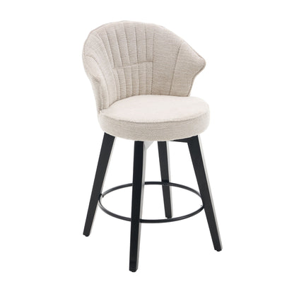 Light gray wingback bar stool with upholstered seat and circular swivel footrest