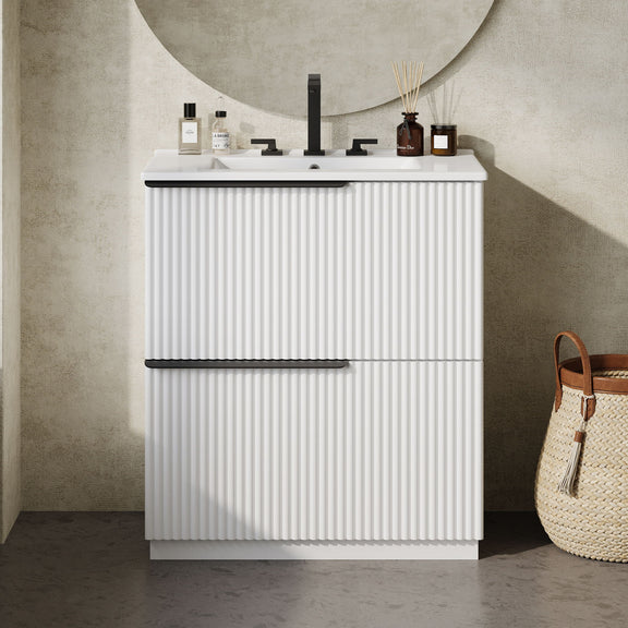 White fluted bathroom vanity with ceramic sink and two-door cabinet front view