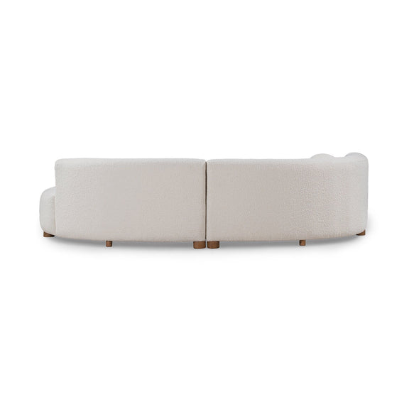Ivory sectional sofa side view with low back and wooden legs
