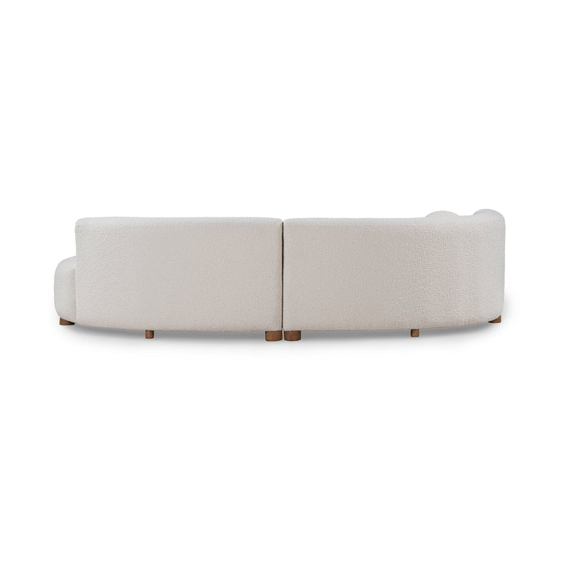 Ivory sectional sofa side view with low back and wooden legs