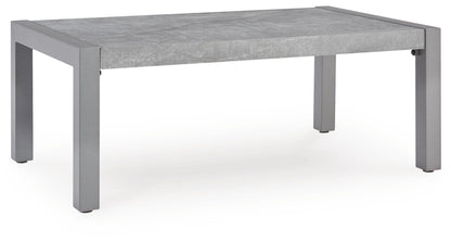 Gray rectangular table with concrete-look top and straight legs.