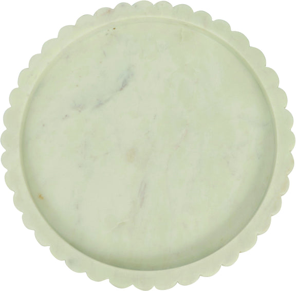 Round white marble tray with scalloped rim and faint veining