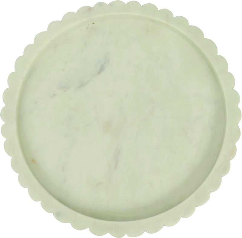 Round white marble tray with scalloped rim and faint veining