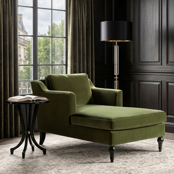 Green upholstered chaise lounge with curved backrest, long seat, and turned feet