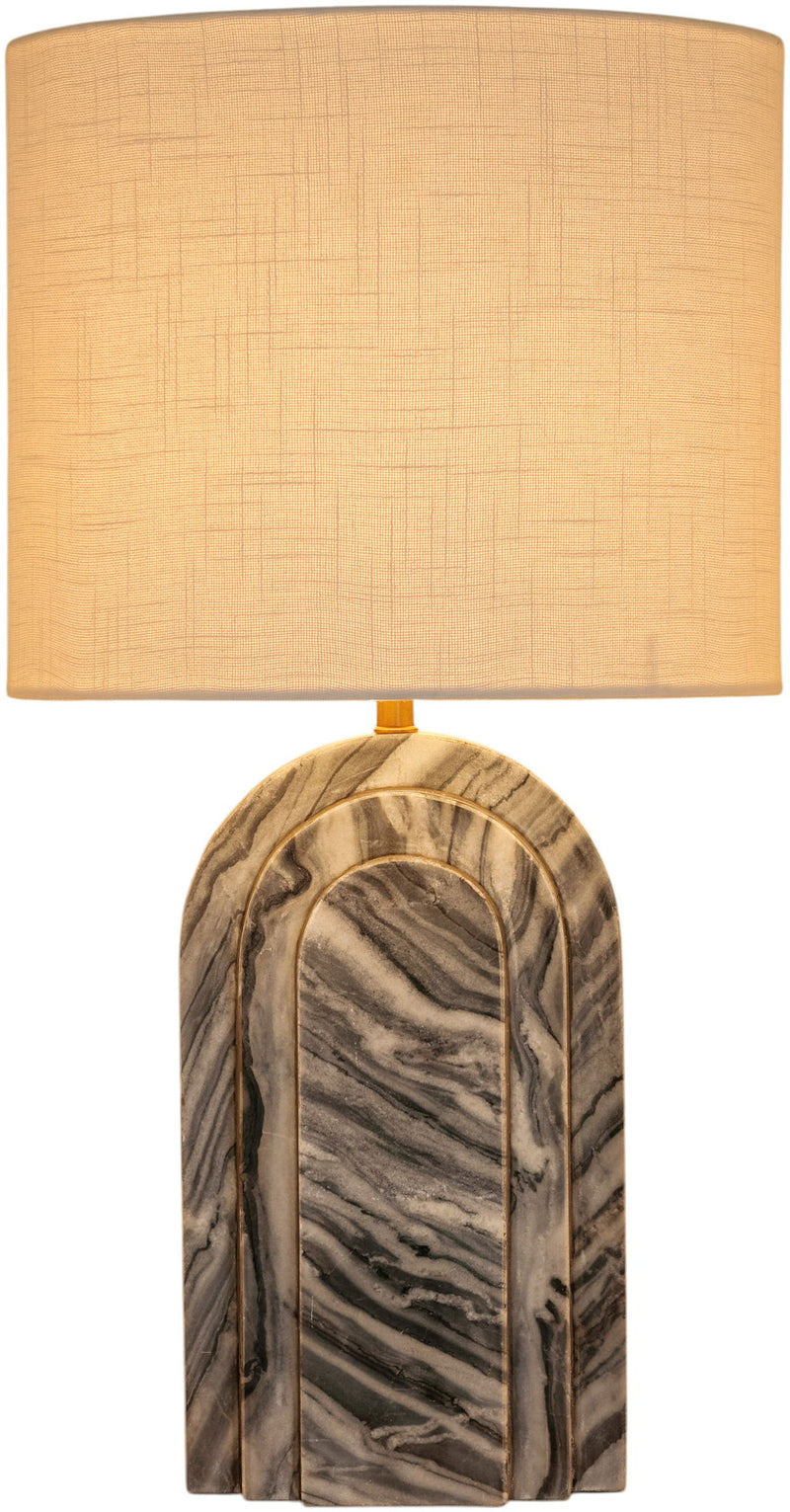 Caldera table lamp with tan fabric shade and marble-look arched base
