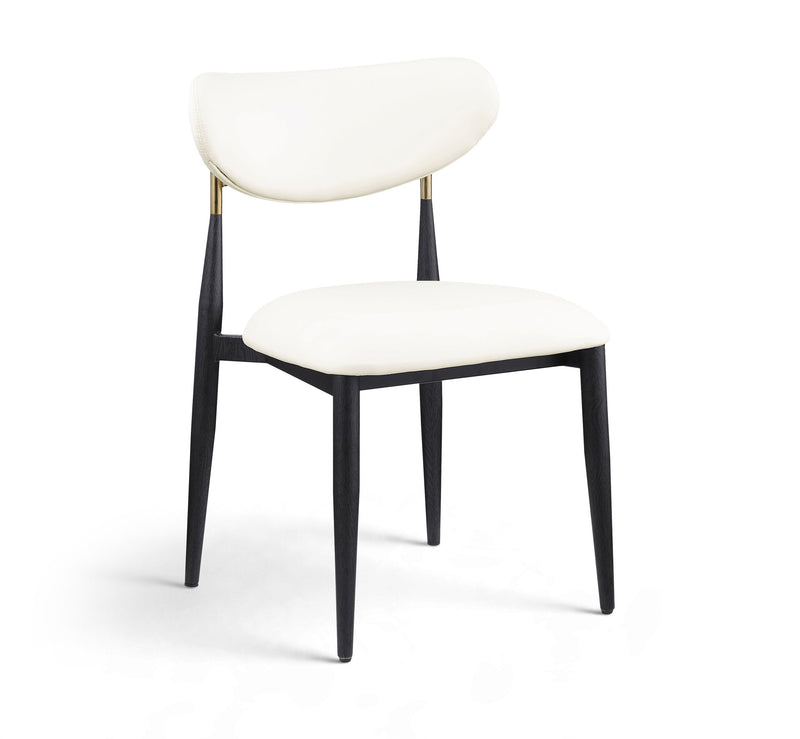 White vegan leather dining side chair with padded seat, rounded back, black legs