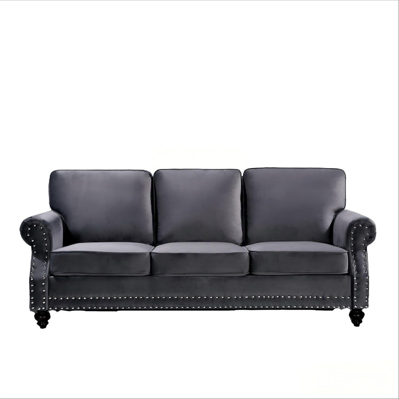 Dark gray 3-seat sofa with nailhead trim, rolled arms, and turned legs