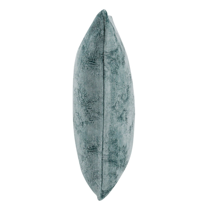 SLD decorative pillow in muted blue, narrow side view showing thickness