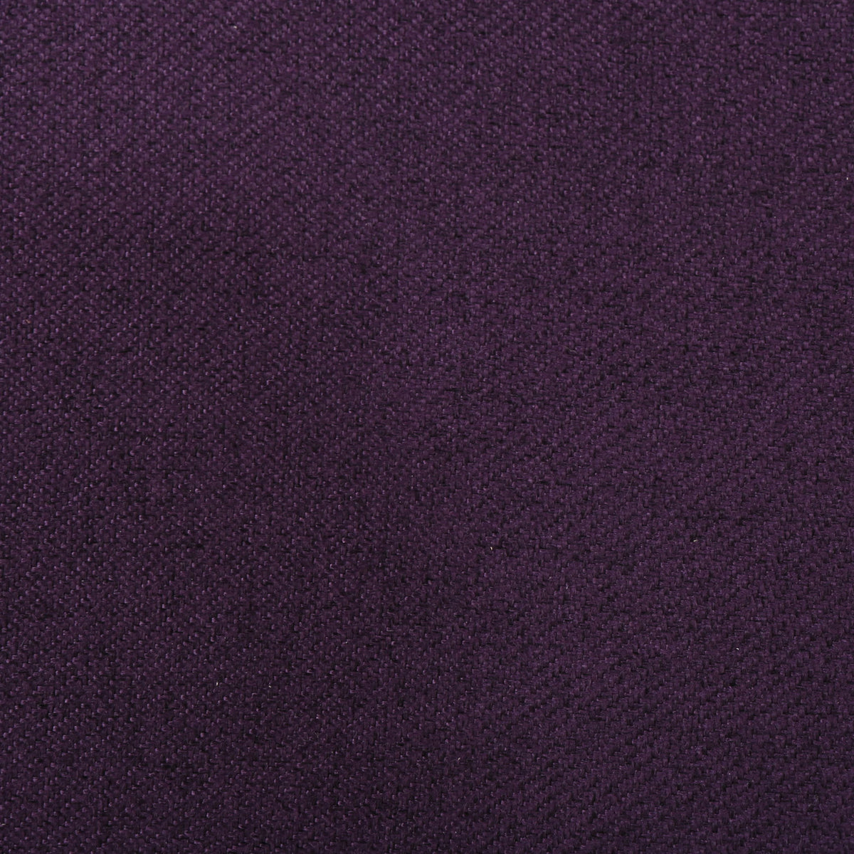 Purple recliner chair upholstery fabric close-up with textured tufted pattern