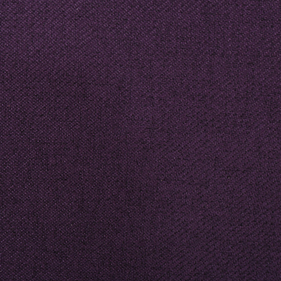 Purple recliner chair upholstery fabric close-up with textured tufted pattern