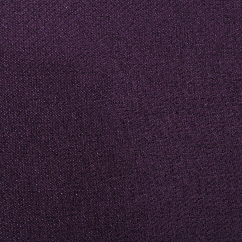 Purple recliner chair upholstery fabric close-up with textured tufted pattern